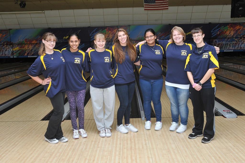 Members of the bowling team pose after a great win.