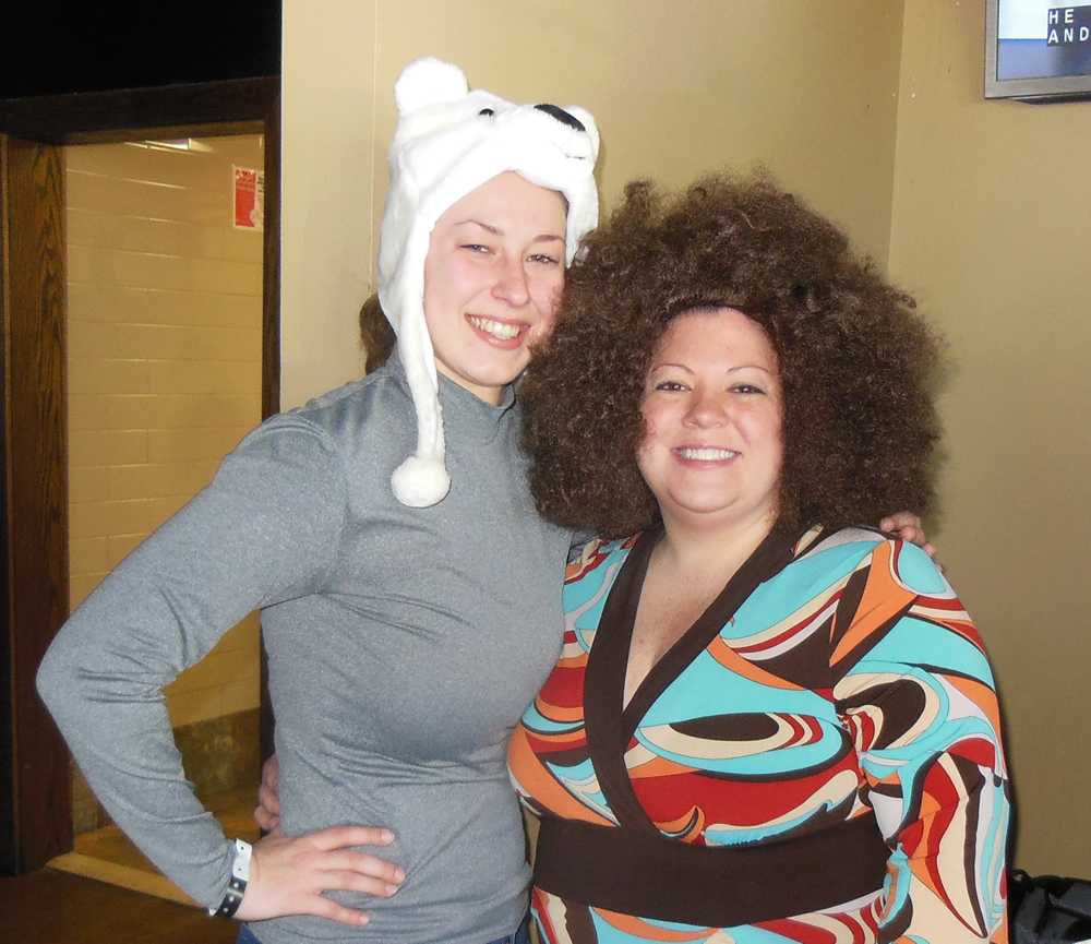 Miss Lombardi rocks her polar bear hat while Miss Simkovich wears her 70s wig as they prepare to plunge into the 37 degree waters of Seaside Heights. 