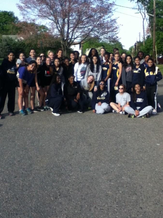 CHS girls track team gathered for a team picture because it was the last meet for the season.