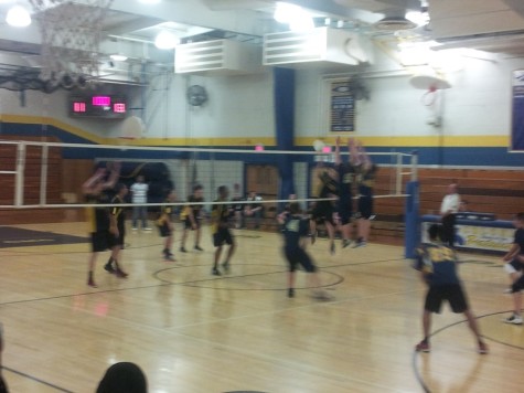The Patriots go up for a block against the South Brunswick Vikings, winning the point.