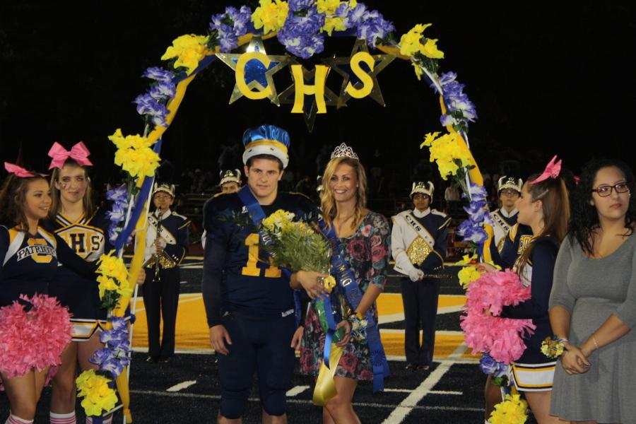 The 2014 King and Queen. Sam Pero and Rachel Joe, are crowned at the Homecoming Football game.