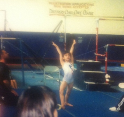 Gymnastics began for Ashley Lorenco when she was just six years old. Here is a photo of Ashley doing gymnastics when she was younger.