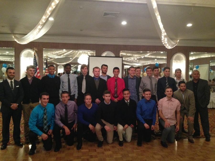 At the end of the year banquet, the Colonia Boys Soccer team joins together for one last picture.