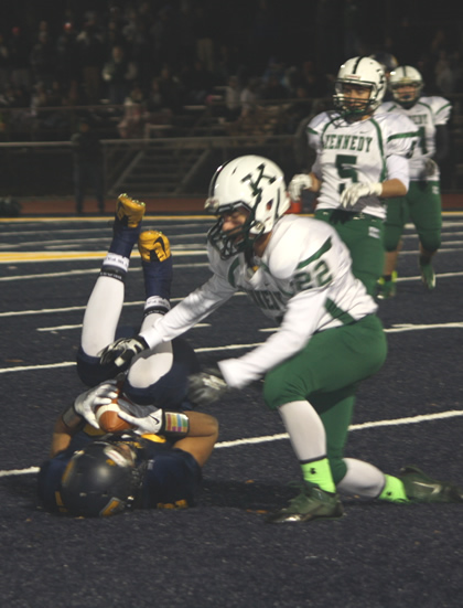 A completed pass during the Colonia vs. JFK football game .