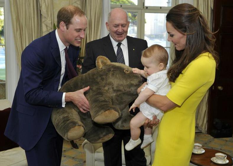 Stealing the heart of people everywhere, royal baby George plays with mom Kate and dad William.