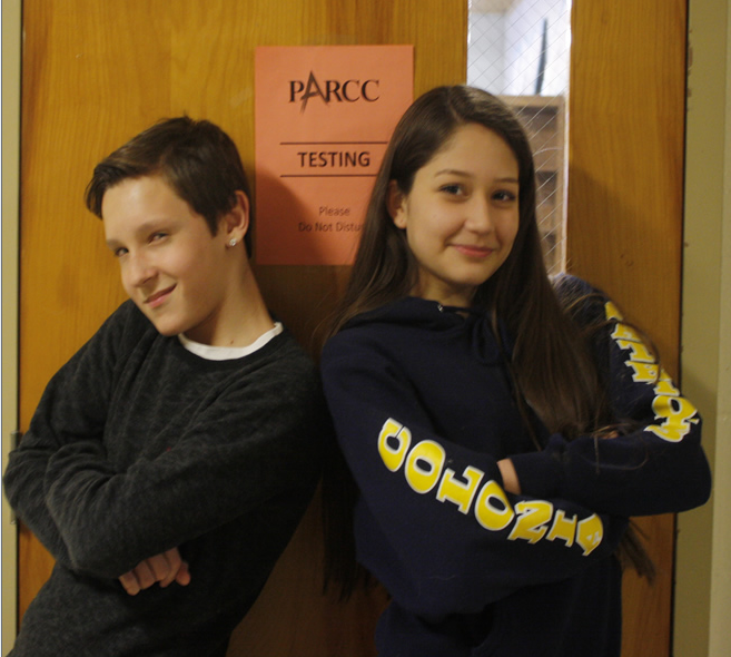 To prepare for PARCC testing, CHS freshmen; Manuela Martinez, and Kyle Kirejevas show their confidence next to a Do Not Disturb PARCC flyer. 