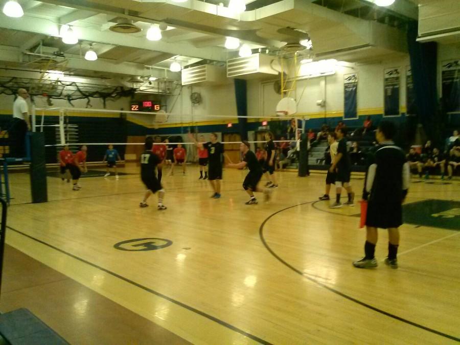 Colonia High School Boys Varsity Volleyball Team in Action.