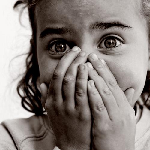 Scared little girl. https://commons.wikimedia.org/wiki/File:Scared_Girl.jpg