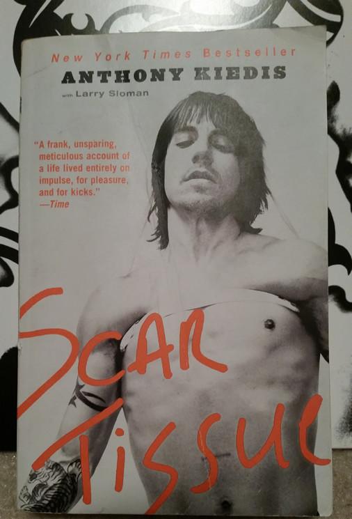 On the cover of Scar Tissue, co-author Anthony Kiedis is pictured being suspended in the air 