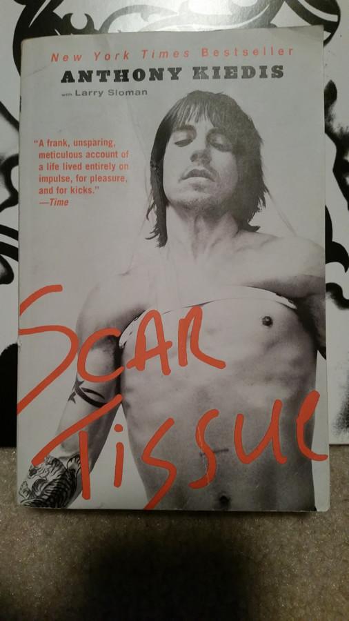 On the cover of Scar Tissue, co-author Anthony Kiedis is pictured being suspended in the air 