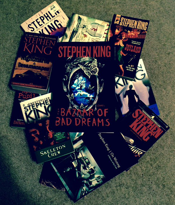 A small pile of Stephen King books with the newest, Bazaar of Bad Dreams on top.