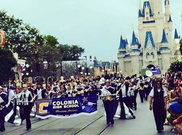 Playing in the Parade, the Marching Patriots play down Main Street at the Magic Kingdom in Disney World last May.