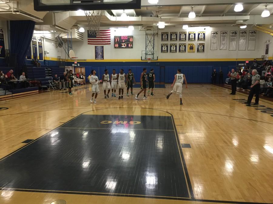 Colonia players take the court for the beginning of the 4th Quarter. 