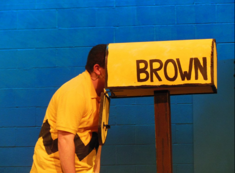 Looking for a Valentine, Charlie Brown(Andrew Fugaro) sticks his head into the mailbox.
