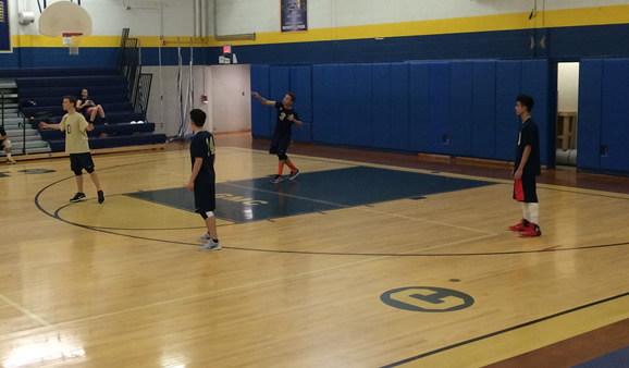 Colonia High Schools varsity boys volleyball team goes against the Pope Johns Lions as Matt Scala serves in the first serve. 