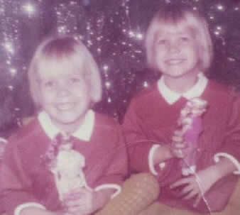 The triplet's mother, Paula and her identical twin sister Patricia when they were young girls.