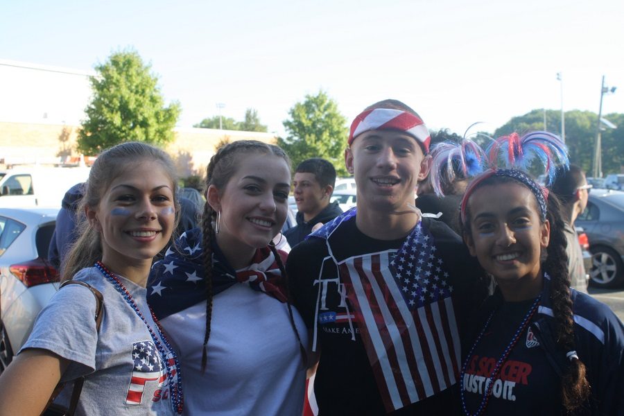 Showing their Patriot pride, students adorn themselves in red, white, and blue for Patriotic Day.