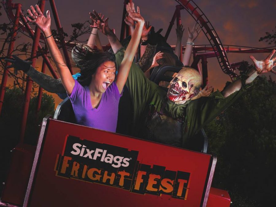 Enjoying+a+ride+at+Fright+Fest+with+a+monster+was+a+screaming+young+girl%0A