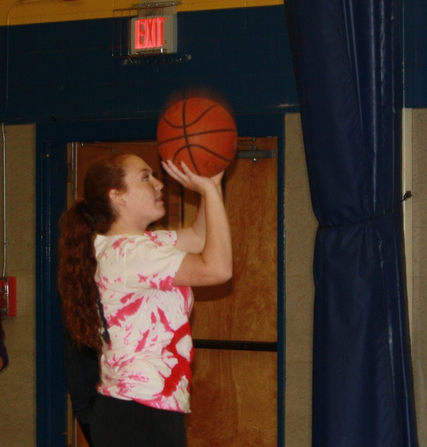 With her arm in the proper 90 degree angle, this shot has the form to be an easy two points.