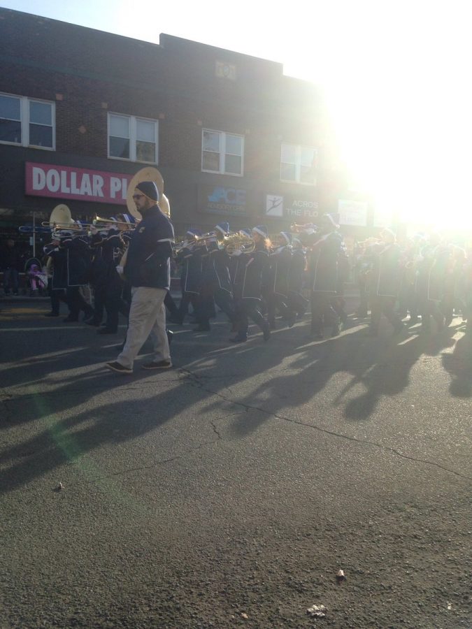 Spreading the holiday spirit the marching patriots take part in the Woodbridge township holiday parade. 