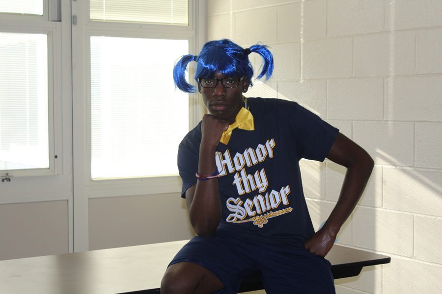 On spirit week, he dressed uncouth with his blue wig and yellow bow. 