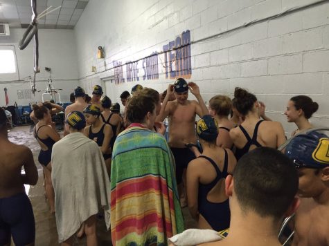 After the match, the Swimming Patriots come together and talk.