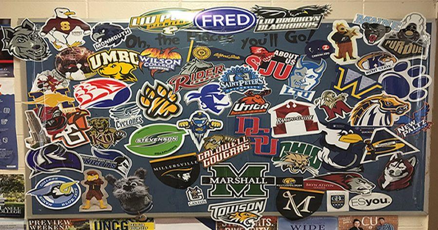 Outside of the guidance office, there is a board of many colleges. 