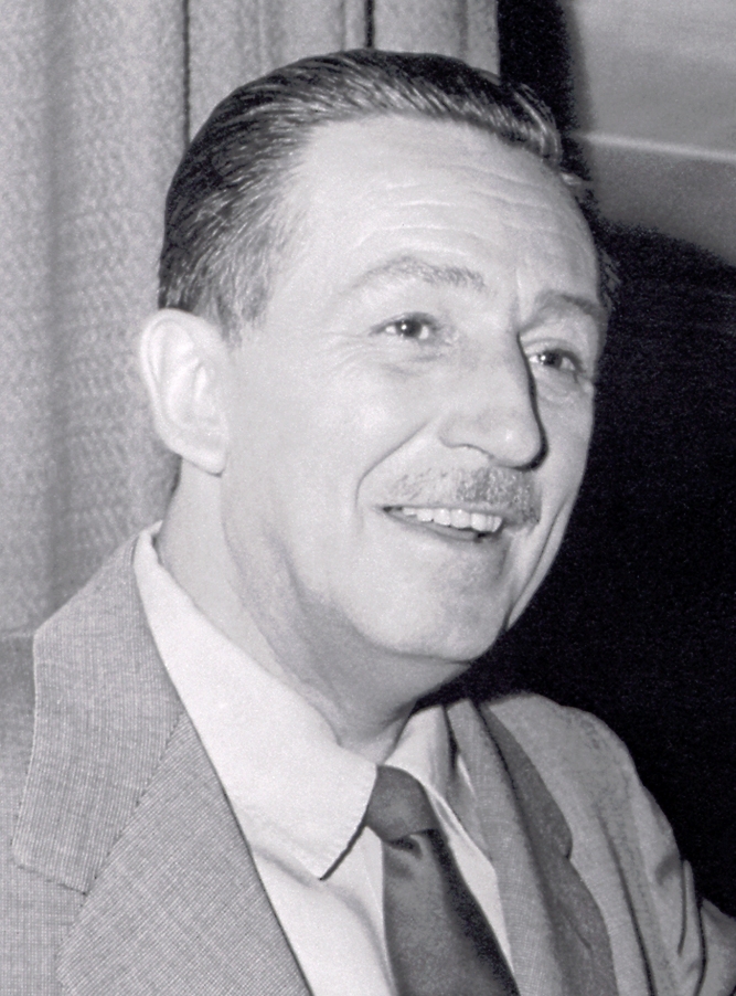 Smiling for a photograph, Walt Disney is excited to receive the Presidential Medal of Freedom.