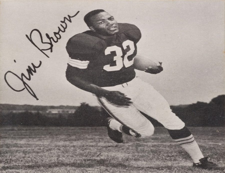 This signed picture of Jim Brown shows the player in action running down the field,