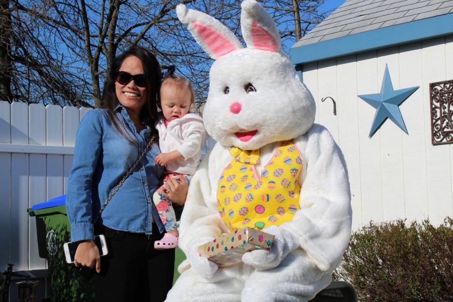 When meeting the Easter Bunny for the first time, some children like Brooklyn Lawrence are skeptical of the large bunny. 