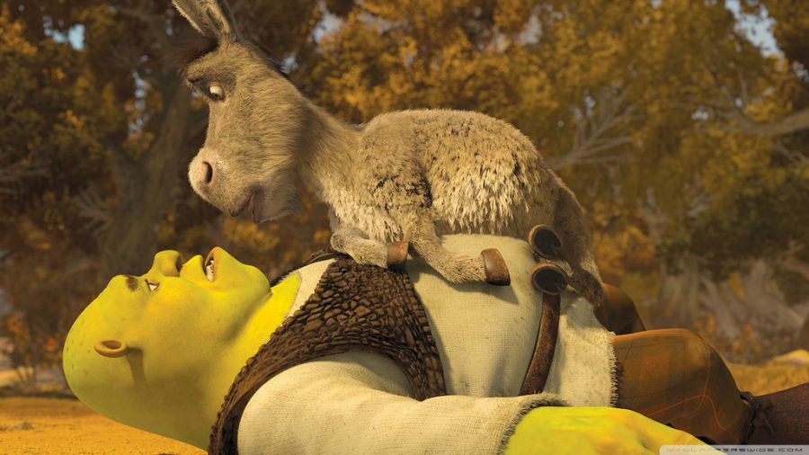 Looking confused, Title character Shrek is tackled to the ground by other highlight character Donkey 