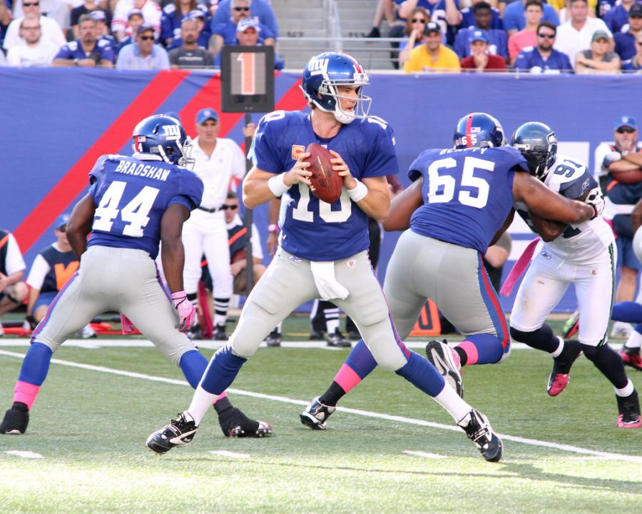 Seen here is Eli Manning dropping back for a pass the same way he will during tonights game.