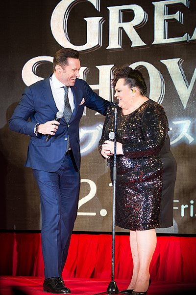 Co-stars Hugh Jackman and Keala Settle joke around at the premiere of The Greatest Showman in Japan.