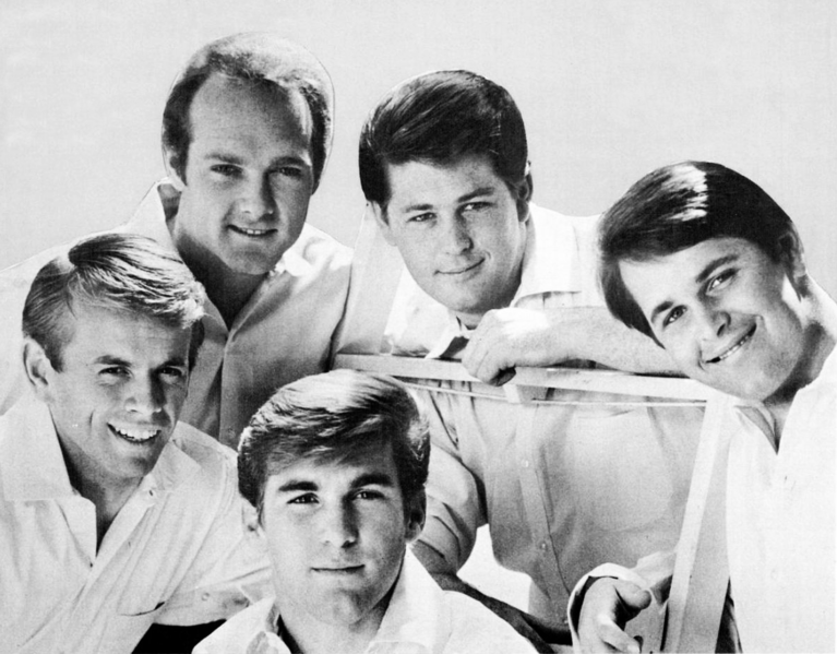Smiling for their single, The Beach Boys enjoy being on top in the music industry.