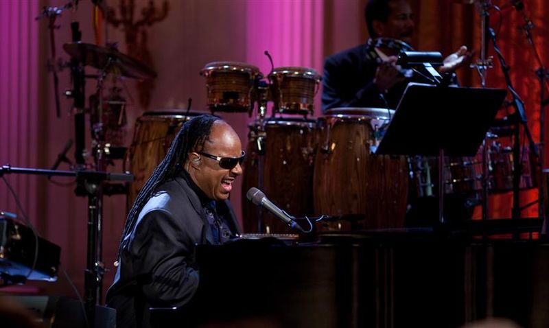 Singing from his critically acclaimed album, Stevie Wonder performs to fans.