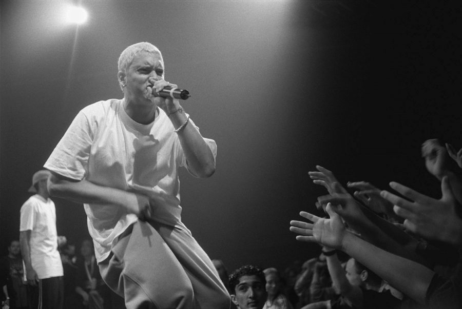 Rapping from his album The Slim Shady LP, Eminem gets the crowd pumped.