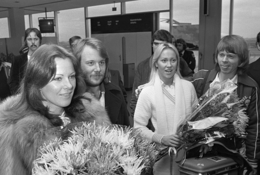 Arriving in a new town for their concert, ABBA, is welcomed by their fans.