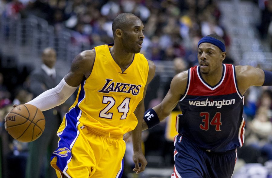 Seen here is Lakers Legend Kobe Bryant (left) being guarded by Paul Pierce of the Wizards (right).