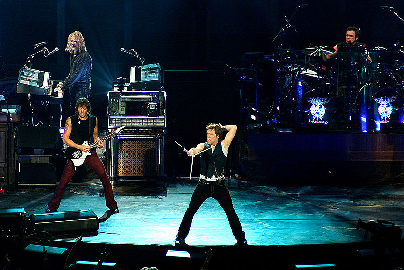Encouraging their fans to sing their number one hit, Bon Jovi sells out the arena. 
