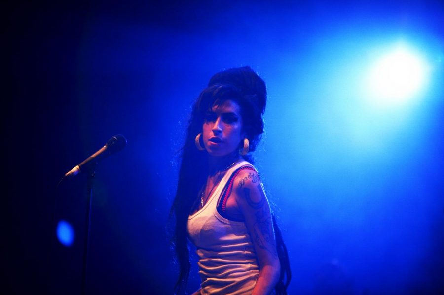 Singing at the concert, Amy Winehouse is ready to perform from her new album.