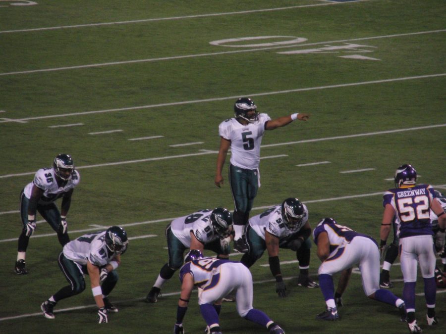 Seen here is Eagles legend Donovan McNabb (#5) calling an audible for the offense at the line of scrimmage.