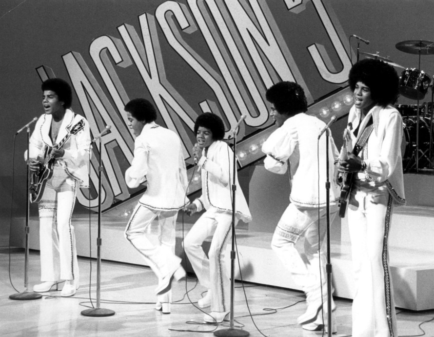 Singing I Want You Back, The Jackson Five perform on a television show. 