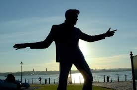 Posing in his signature pose, Elvis Presley legacy was made into a statue.  