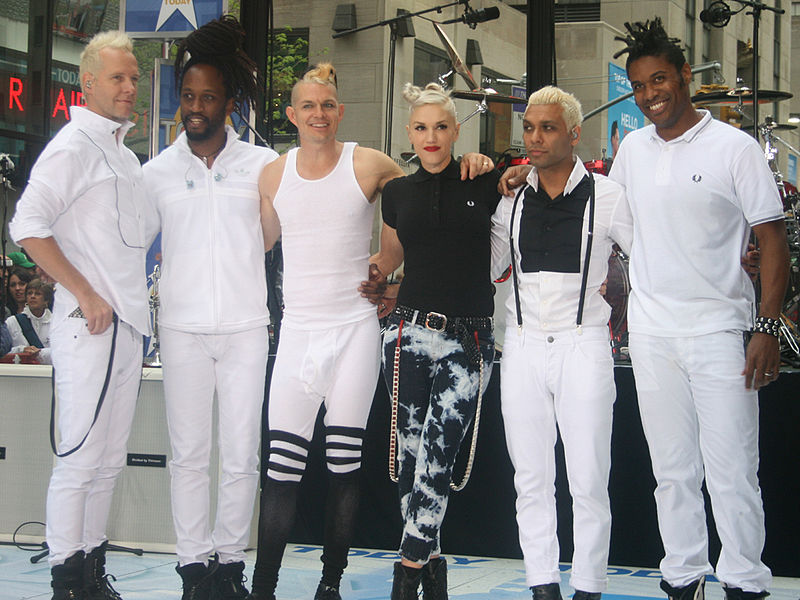 Posing for a photo, No Doubt performs at a concert.