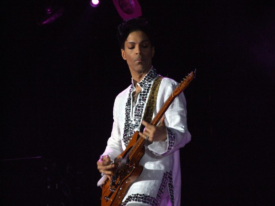 Playing his single Kiss, Prince performs at Coachella. 
