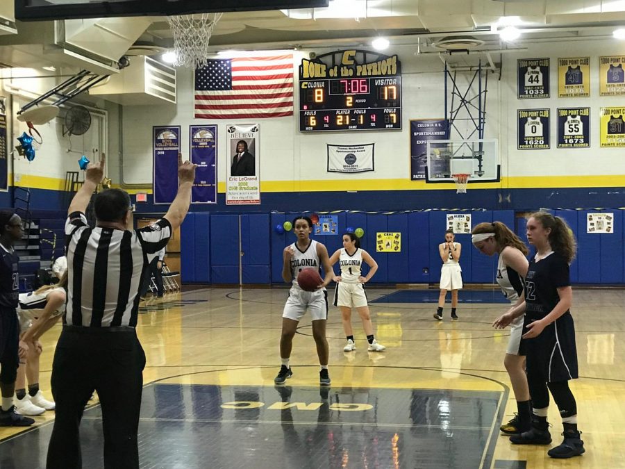 The lady Patriots face against the Zebras of New Brunswick. Martinez takes a free throw for a Colonia point.