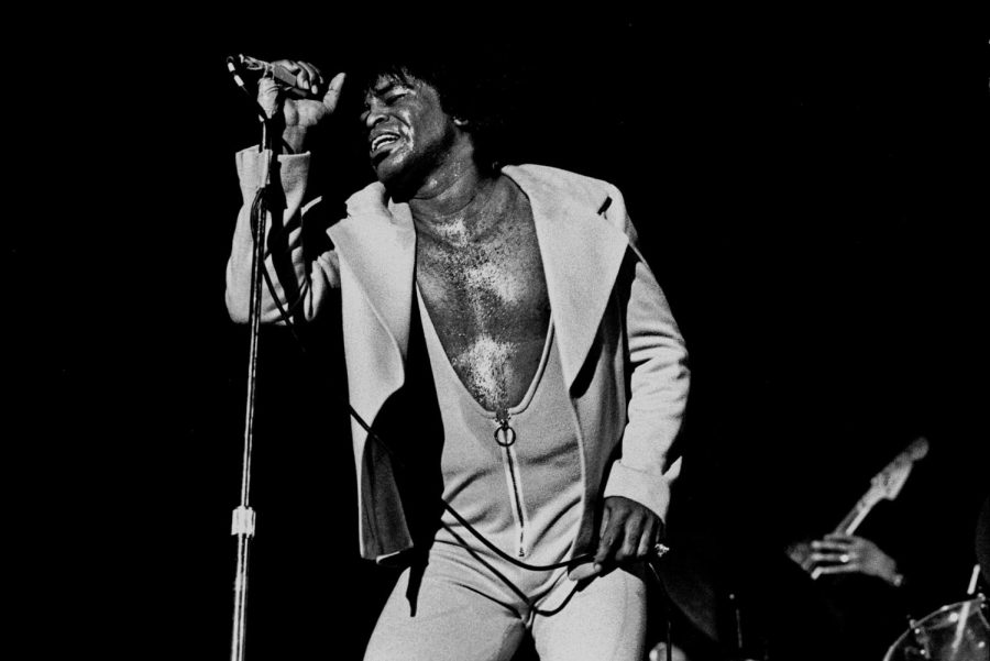 Singing Its a Mans World, James Brown performs in front of thousands of people. 