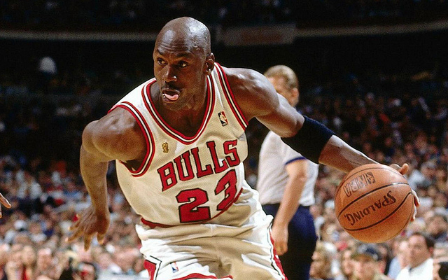 Seen here is NBA legend, and former rookie of the year Michael Jordan, of the Chicago Bulls, driving towards the basket.