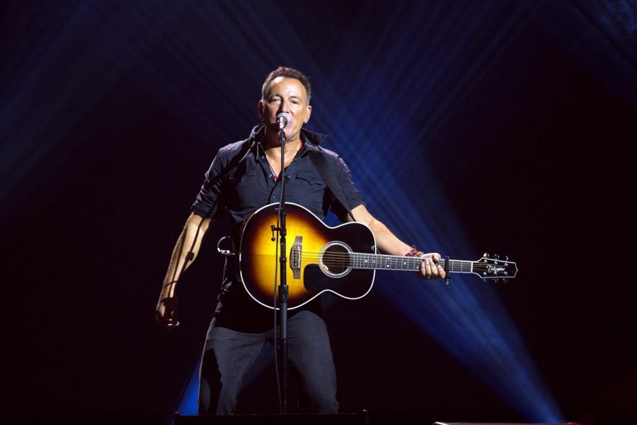 Performing+a+song+from+his+album+Born+in+the+USA%2C+Bruce+Springsteen+jams+out+with+his+audience.+