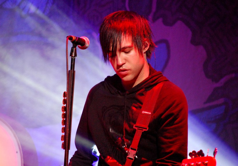 Playing bassist to one of his hits, Pete Wentz and the rest of Fall out Boy perform at the concert. 